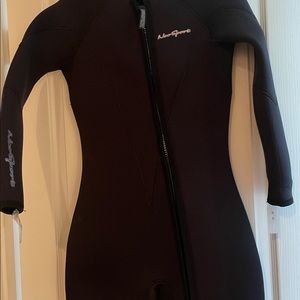 Brand new. Never worn. Wetsuit shorty. Black